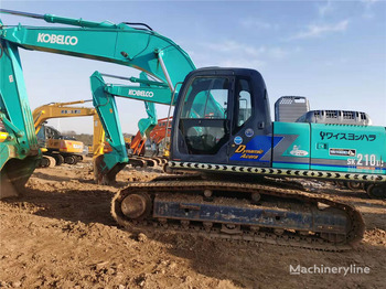 Гусеничный экскаватор KOBELCO