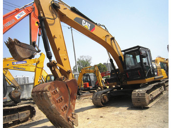 Гусеничный экскаватор CATERPILLAR 323D