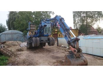 Колёсный экскаватор ATLAS 1505m