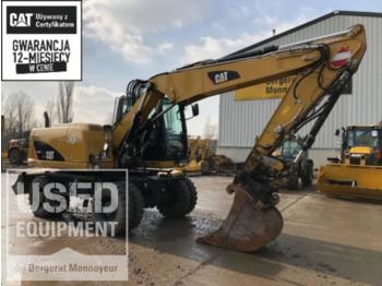 Колёсный экскаватор CATERPILLAR M313D