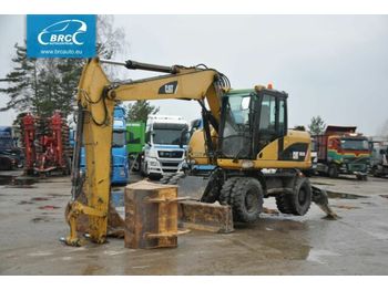 Колёсный экскаватор CATERPILLAR M313 D