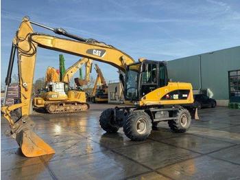 Колёсный экскаватор CATERPILLAR M316D