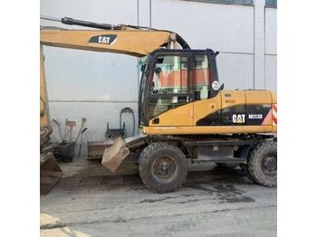Колёсный экскаватор Caterpillar M313D