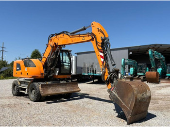 Колёсный экскаватор Liebherr A914: фото 3