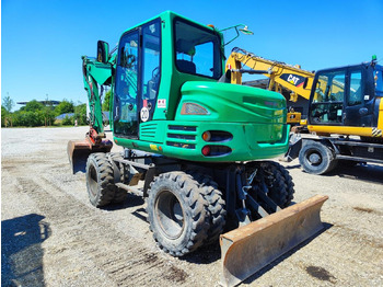 Колёсный экскаватор TAKEUCHI