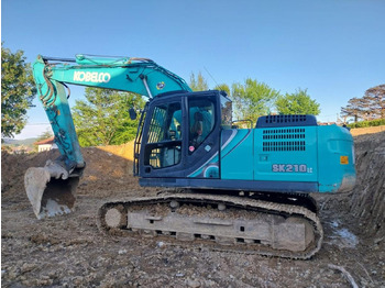 Гусеничный экскаватор KOBELCO