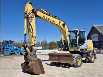 Колёсный экскаватор NEW HOLLAND