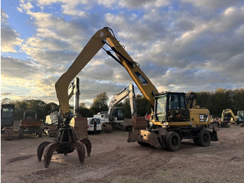 Колёсный экскаватор CATERPILLAR M318