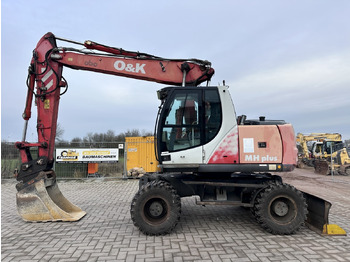 Колёсный экскаватор O&K