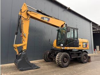 Колёсный экскаватор CATERPILLAR M316D