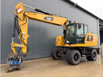 Колёсный экскаватор CATERPILLAR M318F