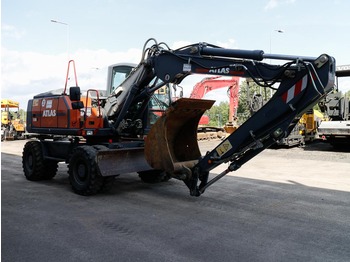 Колёсный экскаватор : фото 4