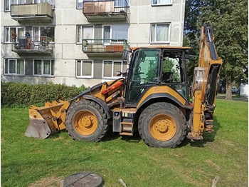 Экскаватор-погрузчик CATERPILLAR
