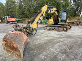 Экскаватор CATERPILLAR