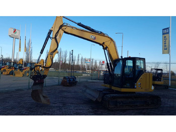 Гусеничный экскаватор CATERPILLAR