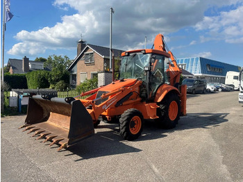 Экскаватор-погрузчик NEW HOLLAND