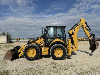 Экскаватор-погрузчик CATERPILLAR