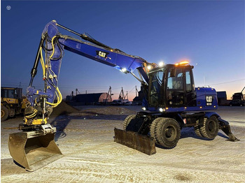 Колёсный экскаватор CATERPILLAR M313D