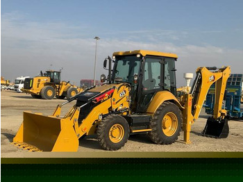 Экскаватор-погрузчик CATERPILLAR
