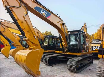 Экскаватор CATERPILLAR 323D