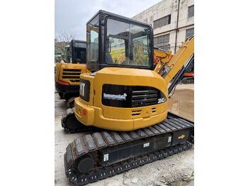 Мини-экскаватор CATERPILLAR