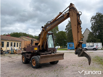 Колёсный экскаватор CASE