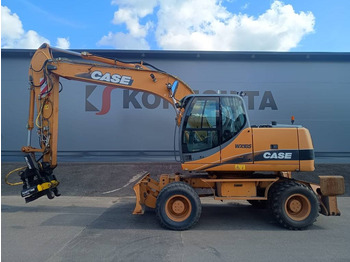 Колёсный экскаватор CASE