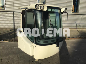 Кабина и интерьер LIEBHERR