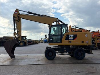 Колёсный экскаватор CATERPILLAR M320F