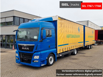 Тентованный грузовик MAN TGX 18.440