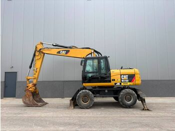 Колёсный экскаватор CATERPILLAR M316D