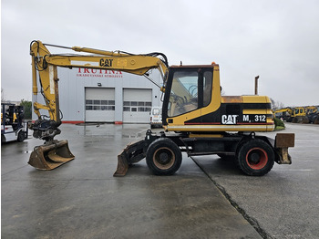 Колёсный экскаватор CATERPILLAR M312