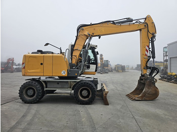 Колёсный экскаватор LIEBHERR A916: фото 4