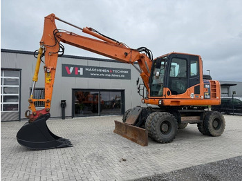 Колёсный экскаватор KOMATSU PW148-8