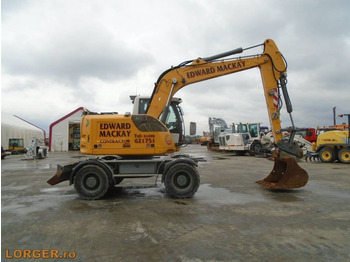 Колёсный экскаватор Liebherr A 914: фото 5