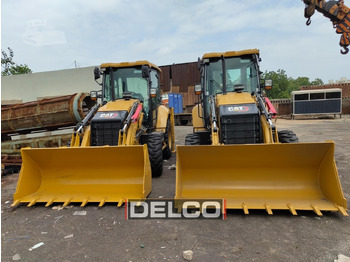 Экскаватор-погрузчик CATERPILLAR