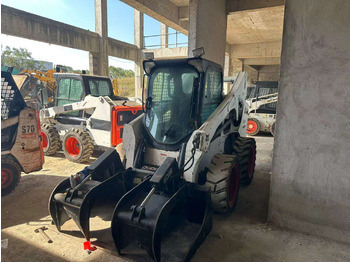 Мини-погрузчик с бортовым поворотом BOBCAT