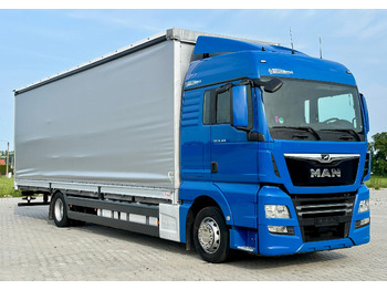 Тентованный грузовик MAN TGX 18.360