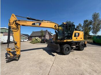 Колёсный экскаватор CATERPILLAR M318