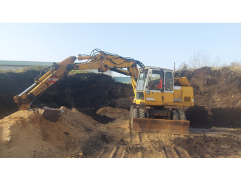 Колёсный экскаватор LIEBHERR