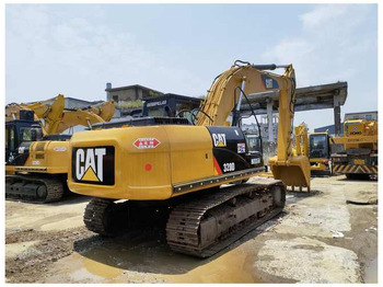 Гусеничный экскаватор CATERPILLAR