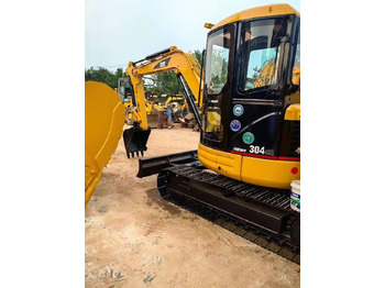 Мини-экскаватор CATERPILLAR