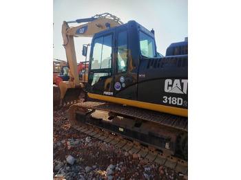 Гусеничный экскаватор CATERPILLAR 318