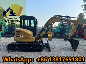 Мини-экскаватор CATERPILLAR