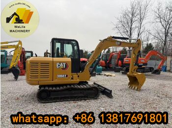 Мини-экскаватор CATERPILLAR