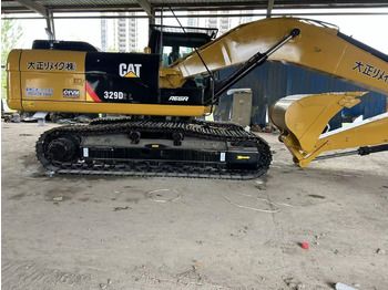 Гусеничный экскаватор CATERPILLAR
