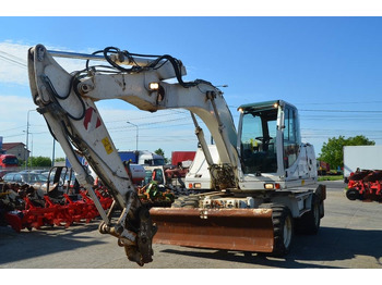 Колёсный экскаватор Case WX 145: фото 2