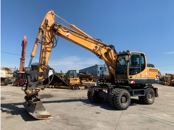 Колёсный экскаватор HYUNDAI