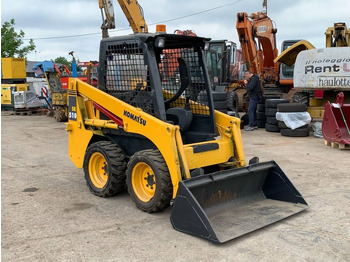Мини-погрузчик с бортовым поворотом KOMATSU