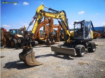 Колёсный экскаватор WACKER